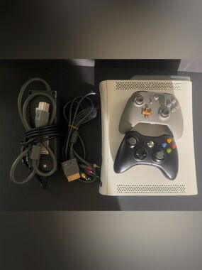 Xbox 360 White Console with non working Black and Gray Wireless Controllers